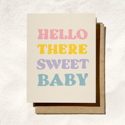 Greeting card with 'Hello there sweet baby' text in pastel colors on a textured background