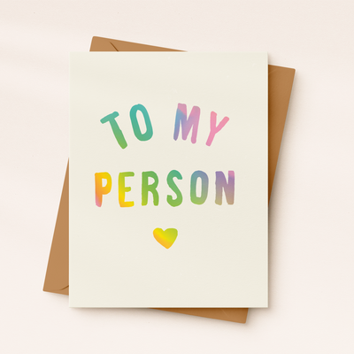 Greeting card with 'To my person' text in colorful letters and a heart on a beige background