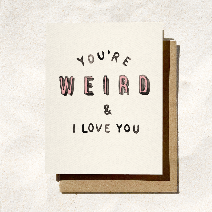 Card with text 'You're Weird & I Love You' on a textured white background