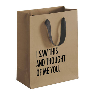 Brown paper bag with black text 'I saw this and thought of me you' on a white background