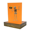 Skeleton Holding Pumpkin on Orange Halloween Card